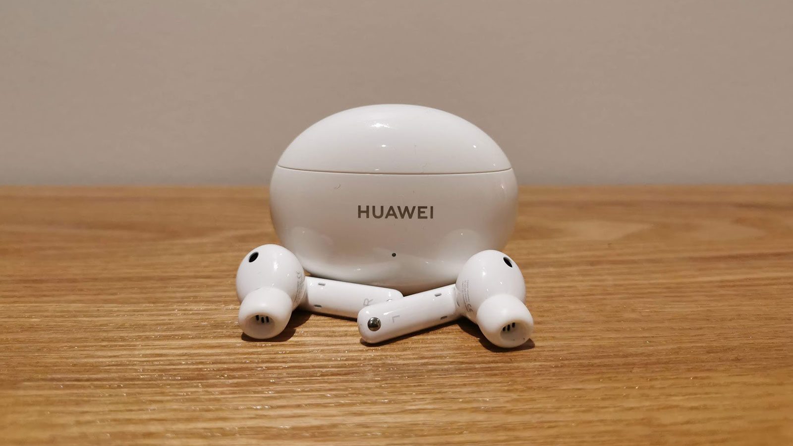 https://www.well-played.com.au/wp-content/uploads/2021/06/huawei-freebuds-4i-featured.jpg